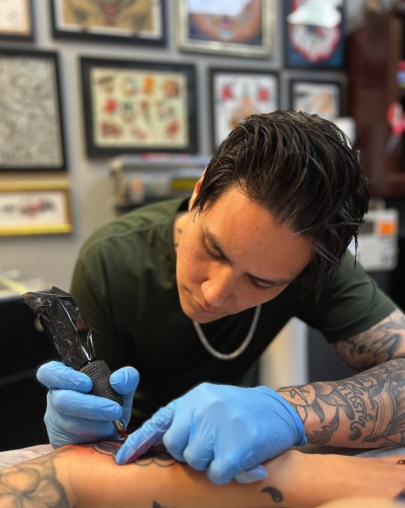 Thai Ky, tattoo artist at Three Arrows Tattoo
